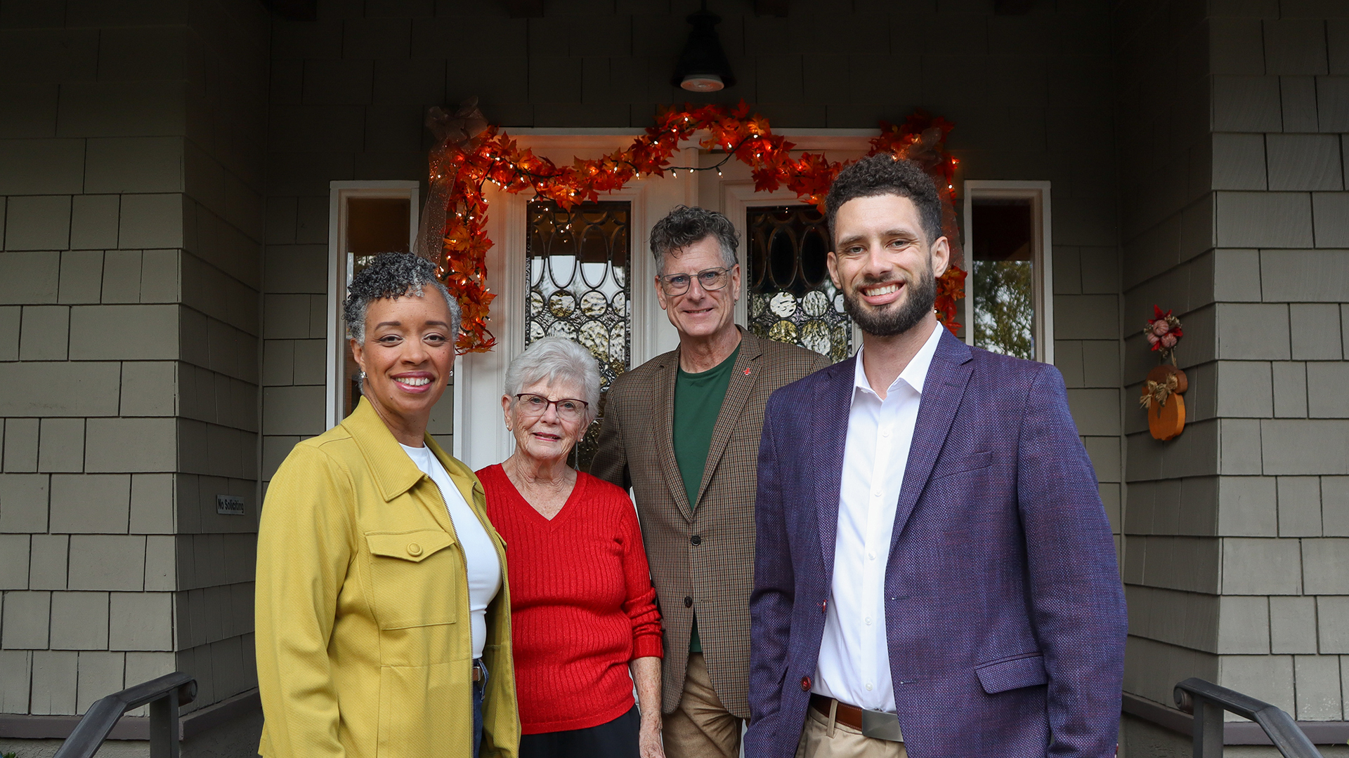 The Theilacker family posed outside their family home. From left, Joyce, Jeannie, Michael Wm. and Michael Z. Theilacker.